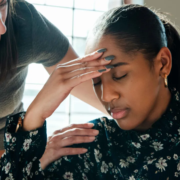 Concerned female patient meeting with doctor
