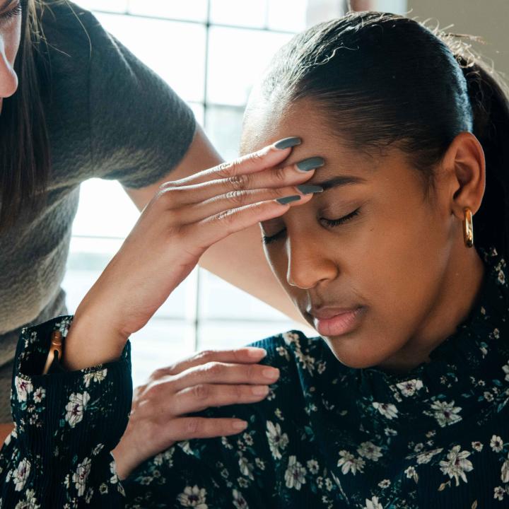 Concerned female patient meeting with doctor