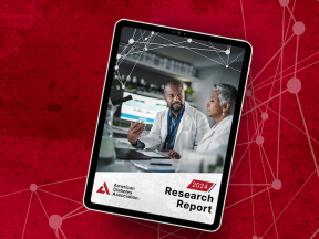 report cover on tablet screen in front of red background