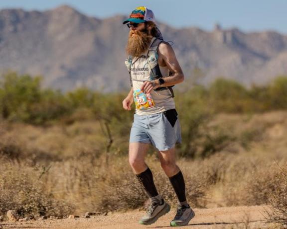 Photo of Kevin running a marathon