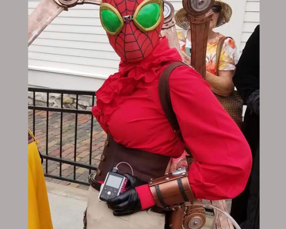 A person dressed as Steampunk Spider-Man with insulin pump