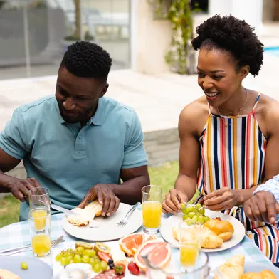 a family enjoying their food
