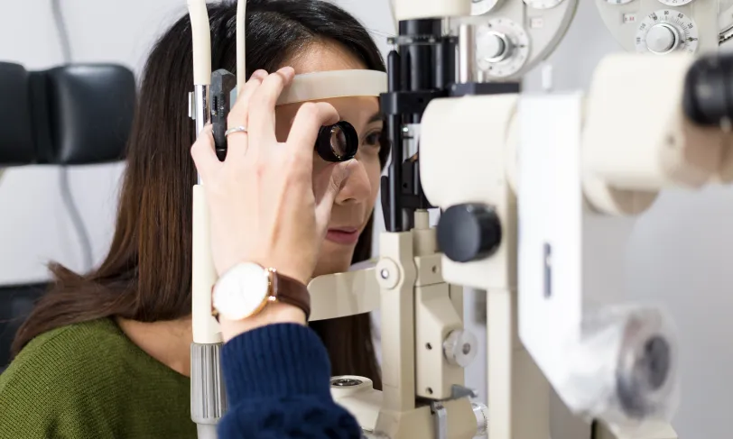 A woman gets her annual diabetes eye exam 