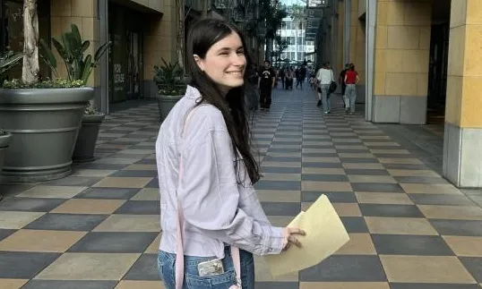 Photo of Camille looking over her shoulder