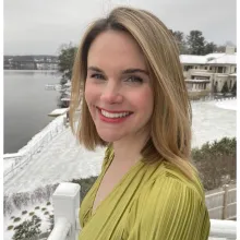 Portrait of a woman outside in snowy weather.