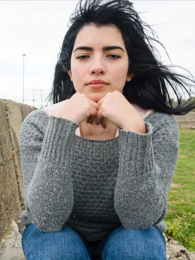 Teenage Latina girl looking sad