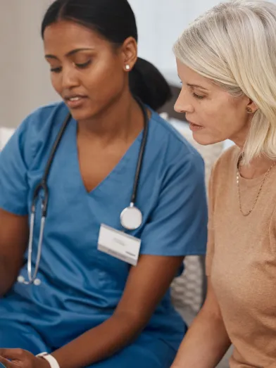 Shot of a doctor reading a pamphlet about covid