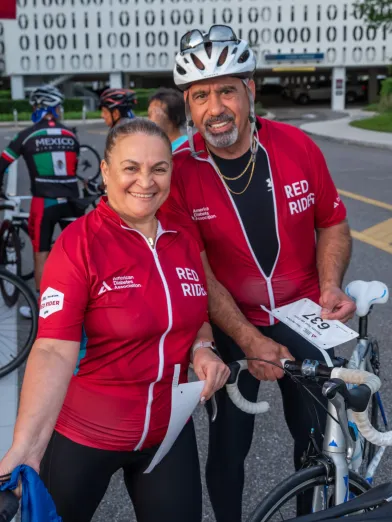 Man and woman at tour de cure event